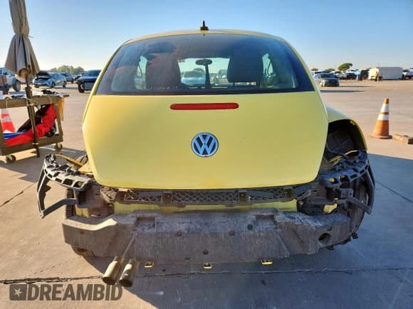 ✅ 2014 Volkswagen Beetle 1.8T • VIN: 3VWJ07AT4EM659688 • Lot: 91010945. Listed on Copart with 132,037 mi. Free auction sales archive from the USA and detailed vehicle history report at DreamBid. Image 6.