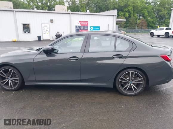 2022 BMW 3 Series 330i xDrive with VIN WBA5R7C05NFM16689, listed as a IAAI auction lot 42530938 with 56,777 mi miles and . Bid and sale history available at DreamBid. Image 14.