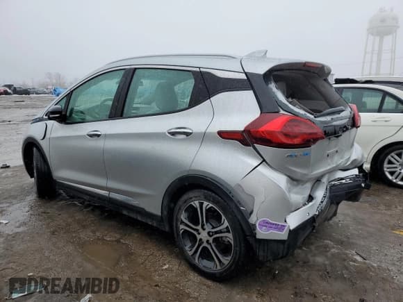 ✅ 2017 Chevrolet Bolt EV Premier • VIN: 1G1FX6S00H4137149 • Лот: 38920614. Опубликован ранее на Copart с пробегом 50 130 миль. Бесплатный доступ к архиву аукционных продаж из США и подробный отчёт об истории автомобиля на DreamBid. Изображение 2.