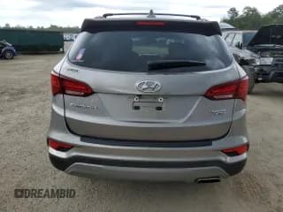 ✅ 2018 Hyundai Santa Fe 2.4L • VIN: 5NMZUDLB0JH070471 • Лот: 49835993. Опубликован ранее на Copart с пробегом 60 751 миль. Бесплатный доступ к архиву аукционных продаж из США и подробный отчёт об истории автомобиля на DreamBid. Изображение 6.