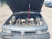 ✅ 1989 Oldsmobile Cutlass Ciera • VIN: 2G3AJ51NXK2439345 • Lot: 42128301. Wystawiony na IAAI z przebiegiem 241 434 mil. Bezpłatny archiwum sprzedaży aukcyjnych z USA i szczegółowy raport historii pojazdu na DreamBid. Zdjęcie 10.