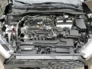 ✅ 2023 Toyota Corolla Cross XLE • VIN: 7MUDAABG6PV048792 • Lot: 59635505. Listed on Copart with 59,189 mi. Free auction sales archive from the USA and detailed vehicle history report at DreamBid. Image 14.