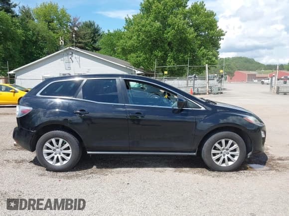 ✅ 2012 Mazda CX-7 i Touring • VIN: JM3ER2CM5C0415574 • Lot: 42263702. Wystawiony na IAAI z przebiegiem 293 566 mil. Bezpłatny archiwum sprzedaży aukcyjnych z USA i szczegółowy raport historii pojazdu na DreamBid. Zdjęcie 14.