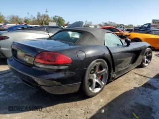 ✅ 2004 Dodge Viper SRT-10 • VIN: 1B3JZ65ZX4V102291 • Lot: 75934444. Listed on Copart with 31,910 mi. Free auction sales archive from the USA and detailed vehicle history report at DreamBid. Image 3.