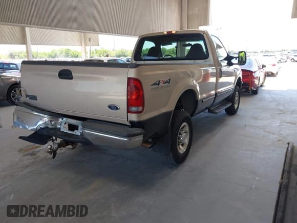 ✅ 1999 Ford F-250 XL • VIN: 1FTNF21F2XED22123 • Lot: 42051505. Listed on IAAI with 296,774 mi. Free auction sales archive from the USA and detailed vehicle history report at DreamBid. Image 4.