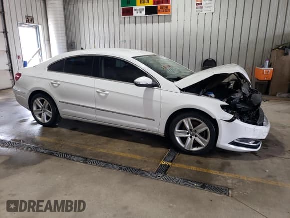 ✅ 2015 Volkswagen CC Sport • VIN: WVWBP7AN0FE800686 • Lot: 69220125. Listed on Copart with 109,951 mi. Free auction sales archive from the USA and detailed vehicle history report at DreamBid. Image 4.