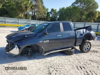 2018 Ram 1500 SLT with VIN 1C6RR6GT9JS104936, listed as a Copart auction lot 52695115 with 74,496 mi miles and Salvage title. Bid and sale history available at DreamBid. Image 1.