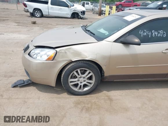 ✅ 2005 Pontiac G6 • VIN: 1G2ZG528854126436 • Lot: 42484292. Wystawiony na IAAI z przebiegiem 201 776 mil. Bezpłatny archiwum sprzedaży aukcyjnych z USA i szczegółowy raport historii pojazdu na DreamBid. Zdjęcie 6.