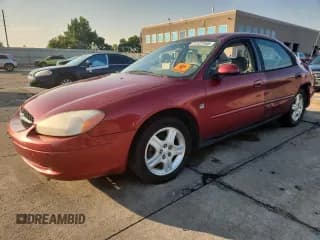 ✅ 2000 Ford Taurus SEL • VIN: 1FAFP56S7YG184583 • Лот: 71127155. Опубликован ранее на Copart с пробегом 158 232 миль. Бесплатный доступ к архиву аукционных продаж из США и подробный отчёт об истории автомобиля на DreamBid. Изображение 1.
