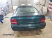 ✅ 1997 Plymouth Neon Highline • VIN: 1P3ES47C0VD102521 • Lot: 38612643. Wystawiony na Copart z przebiegiem 52 881 mil. Bezpłatny archiwum sprzedaży aukcyjnych z USA i szczegółowy raport historii pojazdu na DreamBid. Zdjęcie 6.