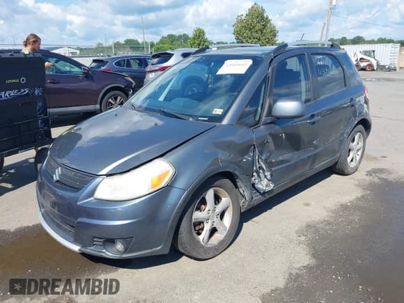 ✅ 2009 Suzuki SX4 Touring AWD • VIN: JS2YB417996201993 • Lot: 43041642. Wystawiony na IAAI z przebiegiem 115 051 mil. Bezpłatny archiwum sprzedaży aukcyjnych z USA i szczegółowy raport historii pojazdu na DreamBid. Zdjęcie 2.
