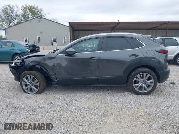 ✅ 2022 Mazda CX-30 S Carbon Edition • VIN: 3MVDMBCL2NM430767 • Lot: 43433804. Wystawiony na IAAI z przebiegiem 69 576 mil. Bezpłatny archiwum sprzedaży aukcyjnych z USA i szczegółowy raport historii pojazdu na DreamBid. Zdjęcie 14.
