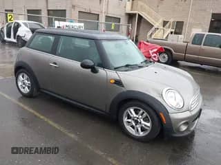 2012 MINI Hardtop with VIN WMWSU3C5XCT262971, listed as a IAAI auction lot 43359213 with 42,086 mi miles and . Bid and sale history available at DreamBid. Image 1.