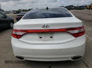 ✅ 2013 Hyundai Azera • VIN: KMHFH4JG8DA330471 • Лот: 70114735. Опубликован ранее на Copart с пробегом 107 874 миль. Бесплатный доступ к архиву аукционных продаж из США и подробный отчёт об истории автомобиля на DreamBid. Изображение 6.