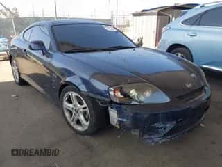 2005 Hyundai Tiburon GT с VIN KMHHN65F35U174645, выставлен на аукционе IAAI как лот 42655120 с пробегом 128 059 миль миль и . История ставок и продаж доступна на DreamBid. Изображение 1.