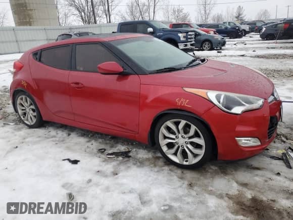 2012 Hyundai Veloster w/Red Int z VIN KMHTC6AD4CU077956, wystawiony jako Copart lot #43504505 z przebiegiem 103 183 mil mil oraz Szkoda całkowita • Salvage title. Historia ofert i sprzedaży dostępna na DreamBid. Obrazek 4.