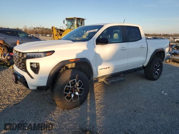 ✅ 2023 GMC Canyon 4WD AT4X • VIN: 1GTP6EEK6P1235575 • Lot: 88637835. Wystawiony na Copart z przebiegiem 30 938 mil. Bezpłatny archiwum sprzedaży aukcyjnych z USA i szczegółowy raport historii pojazdu na DreamBid. Zdjęcie 1.