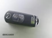 ✅ 2016 Mazda CX-5 Grand Touring • VIN: JM3KE4DY0G0790824 • Lot: 43736594. Wystawiony na IAAI z przebiegiem Nie podano. Bezpłatny archiwum sprzedaży aukcyjnych z USA i szczegółowy raport historii pojazdu na DreamBid. Zdjęcie 11.