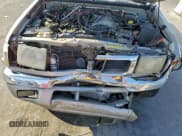 ✅ 2000 Nissan Frontier XE • VIN: 1N6ED27T6YC409553 • Lot: 94641915. Listed on Copart with 216,835 mi. Free auction sales archive from the USA and detailed vehicle history report at DreamBid. Image 11.