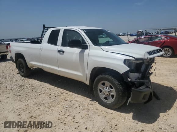 ✅ 2021 Toyota Tundra SR • VIN: 5TFTY5F1XMX011555 • Lot: 65713644. Listed on Copart with 110,914 mi. Free auction sales archive from the USA and detailed vehicle history report at DreamBid. Image 4.