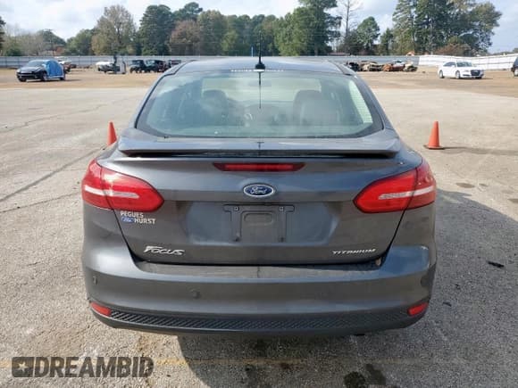 ✅ 2018 Ford Focus Titanium • VIN: 1FADP3J24JL277660 • Лот: 93348165. Опубликован ранее на Copart с пробегом 74 235 миль. Бесплатный доступ к архиву аукционных продаж из США и подробный отчёт об истории автомобиля на DreamBid. Изображение 6.