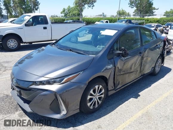 ✅ 2022 Toyota Prius LE • VIN: JTDKAMFP3N3203004 • Lot: 42326756. Listed on IAAI with 126,709 mi. Free auction sales archive from the USA and detailed vehicle history report at DreamBid. Image 2.