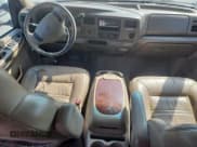 ✅ 2000 Ford Excursion Limited • VIN: 1FMNU42SXYEC61288 • Лот: 80887385. Опубликован ранее на Copart с пробегом 227 943 миль. Бесплатный доступ к архиву аукционных продаж из США и подробный отчёт об истории автомобиля на DreamBid. Изображение 8.