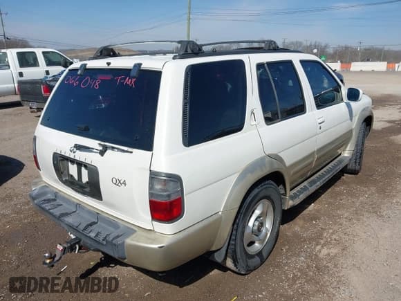 ✅ 1999 Infiniti QX4 Luxury • VIN: JNRAR07Y8XW066048 • Lot: 41714871. Listed on IAAI with 293,501 mi. Free auction sales archive from the USA and detailed vehicle history report at DreamBid. Image 4.