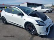 ✅ 2021 Tesla Model Y Performance • VIN: 5YJYGDEF1MF076210 • Lot: 41898153. Listed on IAAI with 48,553 mi. Free auction sales archive from the USA and detailed vehicle history report at DreamBid. Image 1.