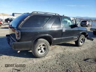 ✅ 2002 Chevrolet Blazer LS • VIN: 1GNCS18W12K136478 • Lot: 88508355. Wystawiony na Copart z przebiegiem 148 791 mil. Bezpłatny archiwum sprzedaży aukcyjnych z USA i szczegółowy raport historii pojazdu na DreamBid. Zdjęcie 3.