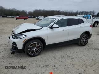✅ 2023 BMW X2 sDrive28i • VIN: WBXYH9C07P5V63719 • Лот: 87309194. Опубликован ранее на Copart с пробегом 43 124 миль. Бесплатный доступ к архиву аукционных продаж из США и подробный отчёт об истории автомобиля на DreamBid. Изображение 1.