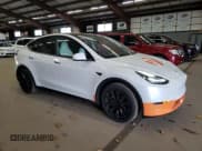 ✅ 2024 Tesla Model Y Long Range • VIN: 7SAYGAEE4RF121950 • Лот: 87409655. Опубликован ранее на Copart с пробегом 23 700 миль. Бесплатный доступ к архиву аукционных продаж из США и подробный отчёт об истории автомобиля на DreamBid. Изображение 4.