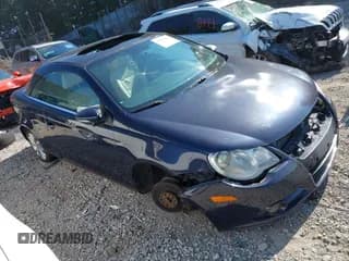 ✅ 2010 Volkswagen Eos Komfort • VIN: WVWBA7AH0AV011877 • Lot: 42804302. Listed on IAAI with 95,264 mi. Free auction sales archive from the USA and detailed vehicle history report at DreamBid. Image 1.