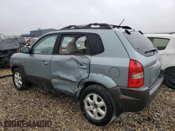 2005 Hyundai Tucson GLS z VIN KM8JN72DX5U214908, wystawiony jako Copart lot #76346024 z przebiegiem 152 677 mil mil oraz Szkoda całkowita • Salvage title. Historia ofert i sprzedaży dostępna na DreamBid. Obrazek 2.