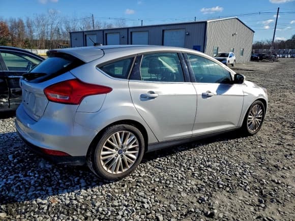 ✅ 2017 Ford Focus Titanium • VIN: 1FADP3N20HL272265 • Lot: 94342025. Listed on Copart with 100,712 mi. Free auction sales archive from the USA and detailed vehicle history report at DreamBid. Image 3.