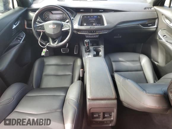 ✅ 2020 Cadillac XT4 AWD Sport • VIN: 1GYFZFR44LF064708 • Лот: 80718575. Опубликован ранее на Copart с пробегом 39 459 миль. Бесплатный доступ к архиву аукционных продаж из США и подробный отчёт об истории автомобиля на DreamBid. Изображение 8.