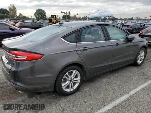 ✅ 2018 Ford Fusion SE • VIN: 3FA6P0HD3JR281442 • Lot: 92839825. Wystawiony na Copart z przebiegiem 103 080 mil. Bezpłatny archiwum sprzedaży aukcyjnych z USA i szczegółowy raport historii pojazdu na DreamBid. Zdjęcie 3.