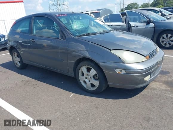 ✅ 2003 Ford Focus ZX3 • VIN: 3FAFP31363R133808 • Лот: 43228389. Опубликован ранее на IAAI с пробегом 214 717 миль. Бесплатный доступ к архиву аукционных продаж из США и подробный отчёт об истории автомобиля на DreamBid. Изображение 1.