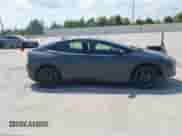 2024 Toyota Prius LE with VIN JTDACAAUXR3032131, listed as a IAAI auction lot 43231631 with 15,535 mi miles and . Bid and sale history available at DreamBid. Image 13.