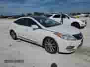 2014 Hyundai Azera Limited с VIN KMHFH4JGXEA352134, выставлен на аукционе Copart как лот 42810485 с пробегом 151 306 миль миль и Списание • Salvage title. История ставок и продаж доступна на DreamBid. Изображение 4.