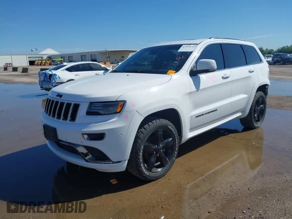 ✅ 2015 Jeep Grand Cherokee Overland • VIN: 1C4RJFCG0FC213585 • Лот: 42456563. Опубликован ранее на IAAI с пробегом 100 974 миль. Бесплатный доступ к архиву аукционных продаж из США и подробный отчёт об истории автомобиля на DreamBid. Изображение 2.