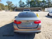 ✅ 2015 Kia Optima EX • VIN: 5XXGN4A7XFG469932 • Lot: 43532157. Listed on IAAI with 203,392 mi. Free auction sales archive from the USA and detailed vehicle history report at DreamBid. Image 16.