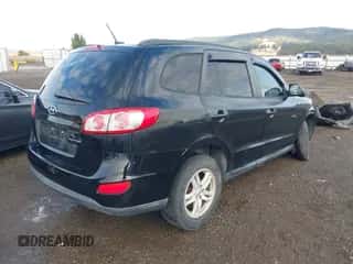 2012 Hyundai Santa Fe GLS with VIN 5XYZGDABXCG121756, listed as a IAAI auction lot 43336322 with 138,396 mi miles and . Bid and sale history available at DreamBid. Image 4.