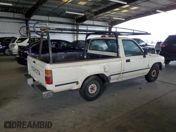 ✅ 1995 Toyota Pickup • VIN: JT4RN81A4S5207818 • Lot: 68381985. Wystawiony na Copart z przebiegiem 254 035 mil. Bezpłatny archiwum sprzedaży aukcyjnych z USA i szczegółowy raport historii pojazdu na DreamBid. Zdjęcie 3.