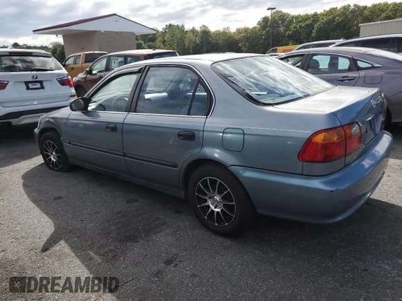 ✅ 1999 Honda Civic LX • VIN: 2HGEJ6572XH533602 • Lot: 80522085. Listed on Copart with 147,278 mi. Free auction sales archive from the USA and detailed vehicle history report at DreamBid. Image 2.