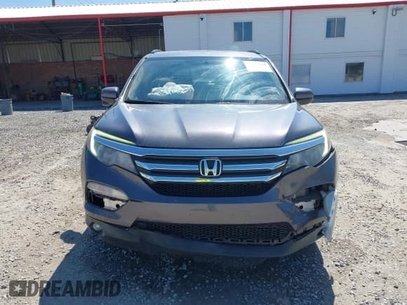 ✅ 2018 Honda Pilot EX-L • VIN: 5FNYF5H50JB006656 • Лот: 43179982. Опубликован ранее на IAAI с пробегом 130 515 миль. Бесплатный доступ к архиву аукционных продаж из США и подробный отчёт об истории автомобиля на DreamBid. Изображение 12.