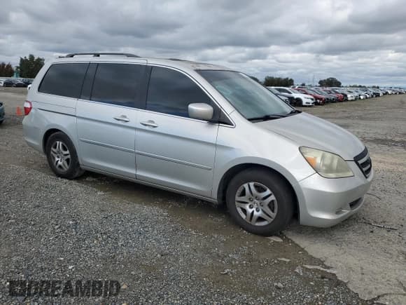 ✅ 2006 Honda Odyssey EX-L • VIN: 5FNRL387X6B039464 • Лот: 93323725. Опубликован ранее на Copart с пробегом 180 680 миль. Бесплатный доступ к архиву аукционных продаж из США и подробный отчёт об истории автомобиля на DreamBid. Изображение 4.