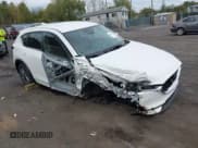 ✅ 2021 Mazda CX-5 Sport • VIN: JM3KFBBM7M0418488 • Lot: 43404330. Listed on IAAI with 36,282 mi. Free auction sales archive from the USA and detailed vehicle history report at DreamBid. Image 1.