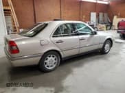 ✅ 1995 Mercedes-Benz C 2.8L • VIN: WDBHA28E8SF115598 • Лот: 50145195. Опубликован ранее на Copart с пробегом 129 134 миль. Бесплатный доступ к архиву аукционных продаж из США и подробный отчёт об истории автомобиля на DreamBid. Изображение 3.