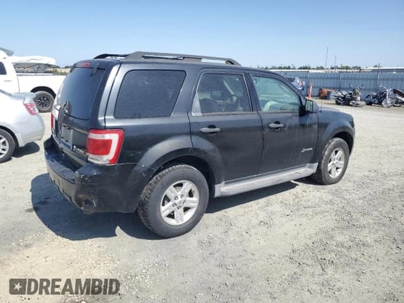 ✅ 2010 Ford Escape Hybrid • VIN: 1FMCU5K3XAKB94785 • Lot: 59623805. Listed on Copart with 149,917 mi. Free auction sales archive from the USA and detailed vehicle history report at DreamBid. Image 3.